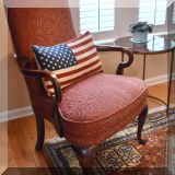 F09. One of a pair of open arm chairs. 43”h x 26”w x 25”d 
